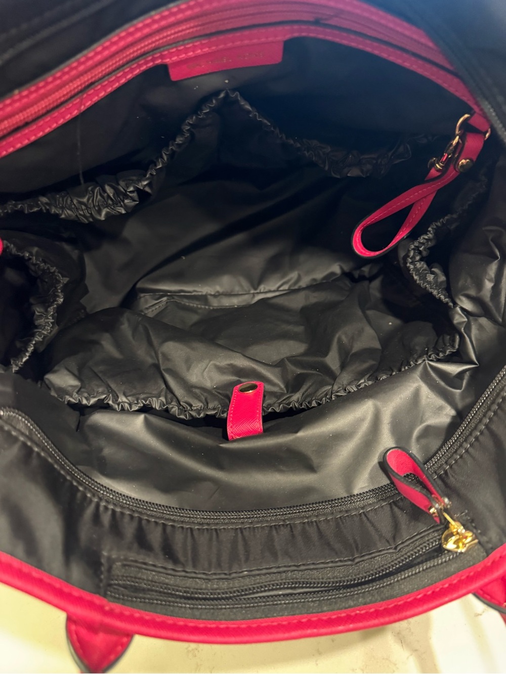 Michael Kors Black diaper bag with Hot Pink Trim and Gold Accents - Picture 2 of 12